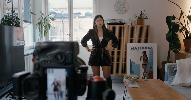Mira on set at home, in front of the camera
